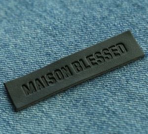 Aangepaste textuur lederen merk label